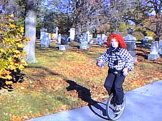 The clown with red hair.